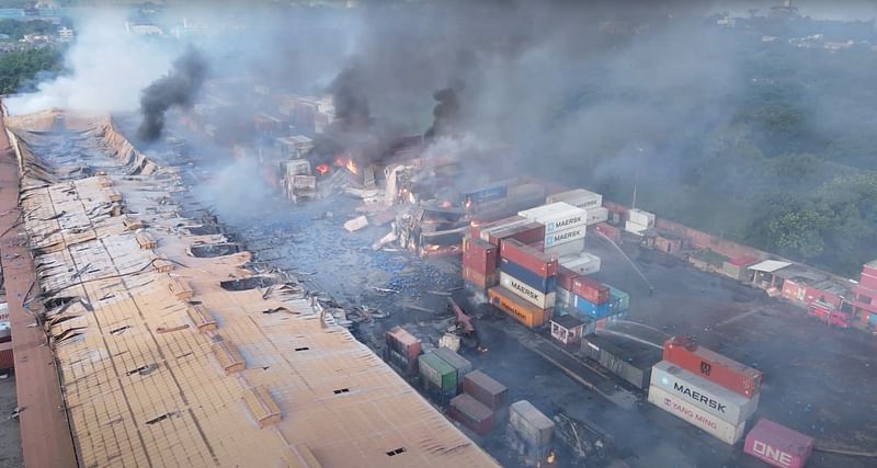 Drone footage shows smoke rising from the spot after a massive fire broke out in an inland container depot at Sitakunda, near the port city Chittagong, Bangladesh, on 5 June 2022 in this still image obtained from a handout video