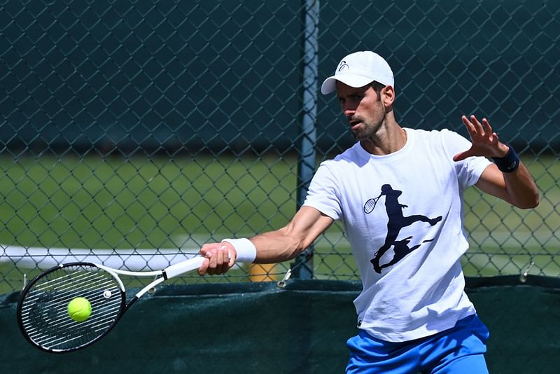 Serbia's Novak Djokovic returns the ball during a training session during the 2022 Wimbledon Championships at The All England Tennis Club in Wimbledon, southwest London, on 26 June, 2022