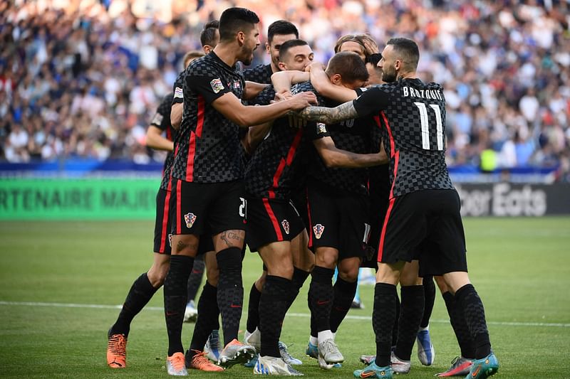 Croatia's players celebrate their first goal during the UEFA Nations League - League A Group 1 football match between France and Croatia at the Stade de France in Saint-Denis, on the outskirts of Paris on 13 June, 2022