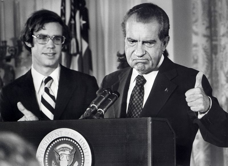 In this file photo taken on 9 August, 1974 The 37th President of the United States, Richard Nixon, he bids farewell to the White House staff