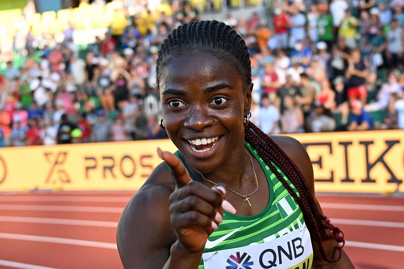 Nigeria's Tobi Amusan reacts after winning the women's 100m hurdles final during the World Athletics Championships at Hayward Field in Eugene, Oregon on 24 July, 2022