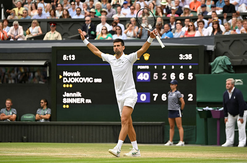 Serbia's Novak Djokovic celebrates winning his quarter final match against Italy's Jannik Sinner