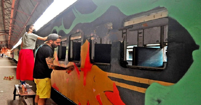 Lucas Gilinger, and his wife Livia Gilinger busy in painting the shuttle train of CU