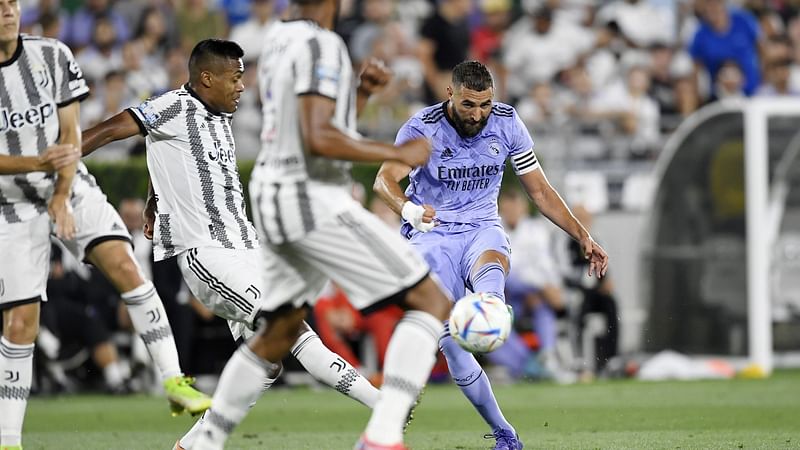 Karim Benzema of Real Madrid takes a shot on goal against Juventus during their friendly soccer match at the Rose Bowl on 30 Jul, 2022 in Pasadena, California