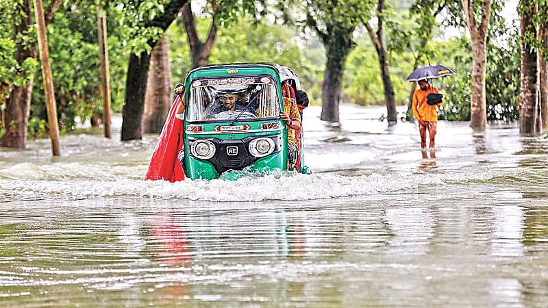 Different spots of Sylhet-Gowainghat road has submerged once again following heavy rain for two days and flash flood. The photo is taken at Salutikar area in Gowainghat upazila, Sylhet, on 30 June 2022