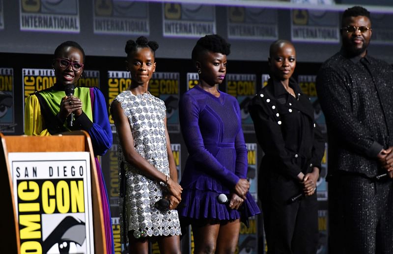 Actors Lupita Nyong'o, Letitia Wright, Danai Gurira, Florence Kasumba and Winston Duke present "Black Panther: Wakanda Forever" at the Marvel panel in Hall H of the convention center during Comic-Con International in San Diego, California, 23 July, 2022