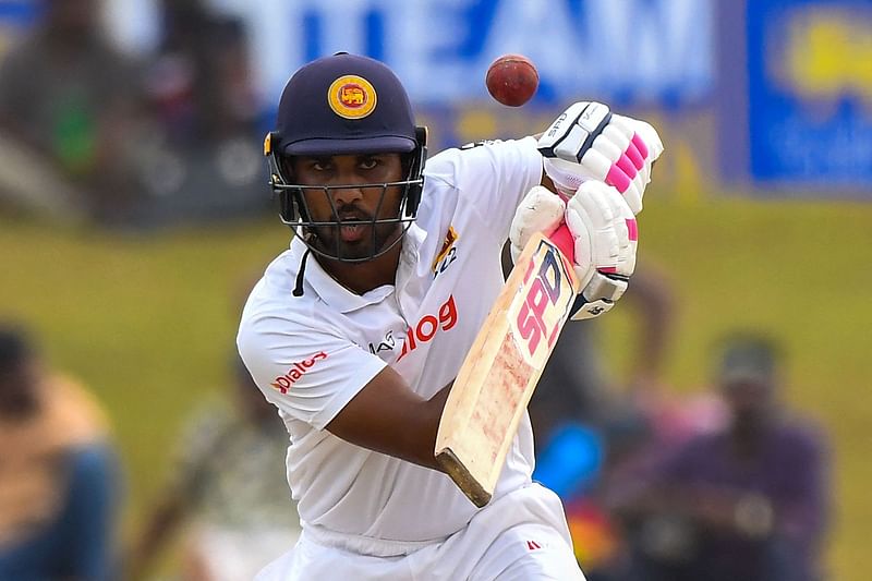 Sri Lanka's Dinesh Chandimal plays a shot during the first day of the second cricket Test match between Sri Lanka and Pakistan at the Galle International Cricket Stadium in Galle on 24 July, 2022