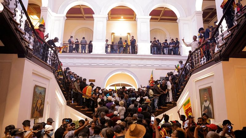 Demonstrators protest inside the President's House, after President Gotabaya Rajapaksa fled, amid the country's economic crisis, in Colombo, Sri Lanka, on 9 July 2022