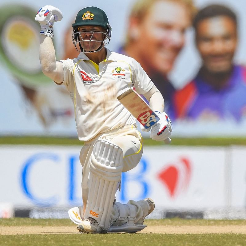 Australia's David Warner celebrates after winning the first cricket Test match between Sri Lanka and Australia at the Galle International Cricket Stadium in Galle on 1 July, 2022