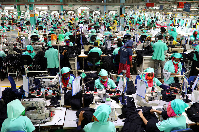 Employees work at at a garments factory in Gazipur, Bangladesh on 7 February 2021.