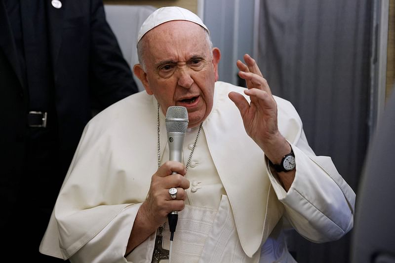 Pope Francis speaks during a news conference aboard the papal plane on his flight back after visiting Canada on 29 July, 2022