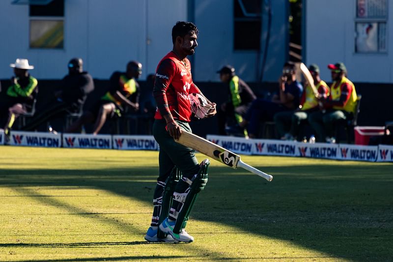 Bangladesh batsman Liton Das walks off the pitch after loosing his wicket during the first T20 cricket match played between Bangladesh and hosts Zimbabwe, on 30 July, 2022 at the Harare Sports Club