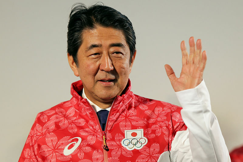 Japanese Prime Minister Shinzo Abe visits the Japan House to greet his country's Olympic athletes and delegates, in Rio de Janeiro on 21 August 2016