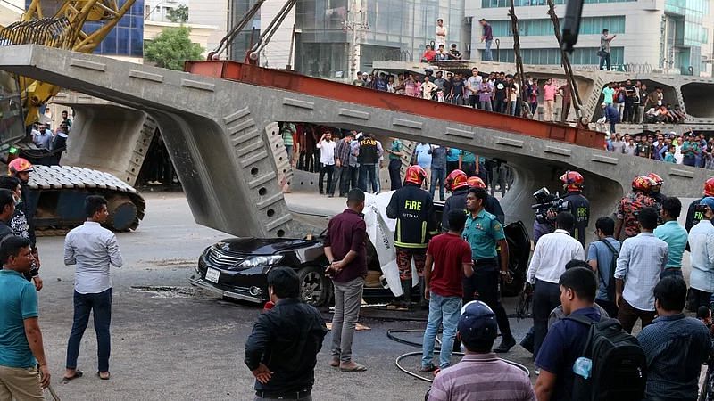 A private car crushed under the BRT project girder. Picture was taken from Uttara, Dhaka on 15 August 2022