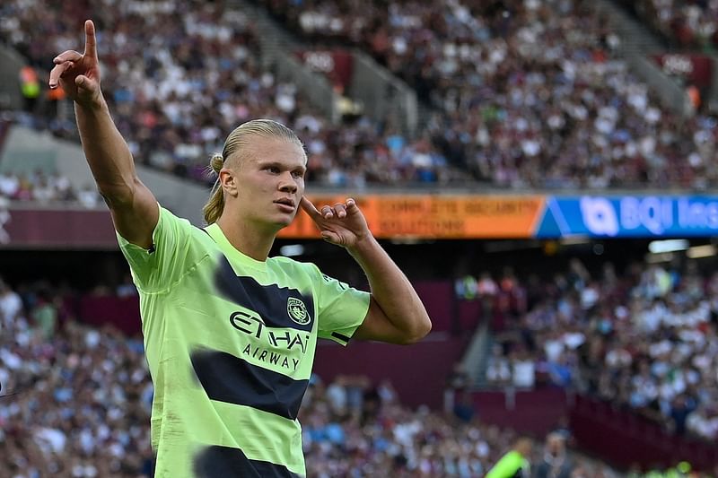 Manchester City's Norwegian striker Erling Haaland celebrates after scoring their second goal during the English Premier League football match between West Ham United and Manchester City at the London Stadium, in London on 7 August, 2022