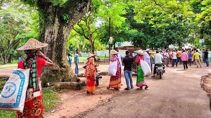 Tea plantation workers take preparation to resume work on 22 August 2022. The photo is taken at Bharaura Tea Estate, Sreemangal, Moulvibazar