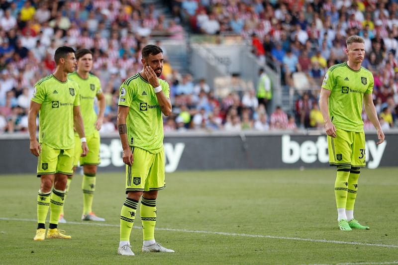 Manchester United's Portuguese striker Cristiano Ronaldo, Manchester United's defender Harry Maguire, midfielder Bruno Fernandes and midfielder Scott McTominay await a corner kick during the English Premier League match between Brentford and Manchester United at Gtech Community Stadium in London on 13 August, 2022