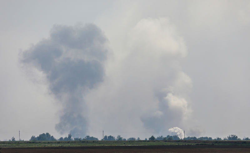 A view shows smoke rising above the area following an alleged explosion in the village of Mayskoye in the Dzhankoi district, Crimea on 16  August, 2022