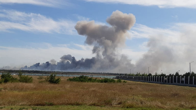 Smoke rises after explosions were heard from the direction of a Russian military airbase near Novofedorivka, Crimea, in this still image obtained by Reuters on 9 August, 2022