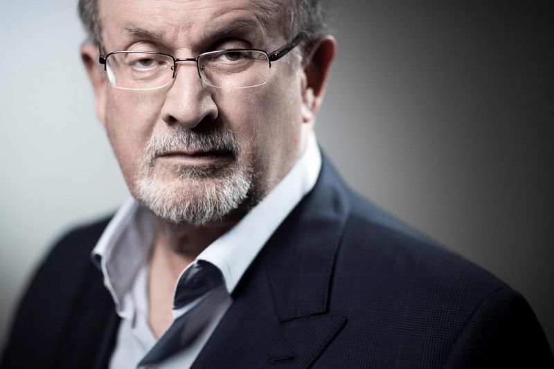 In this file photo taken on 10 September, 2018, British novelist and essayist Salman Rushdie poses during a photo session in Paris