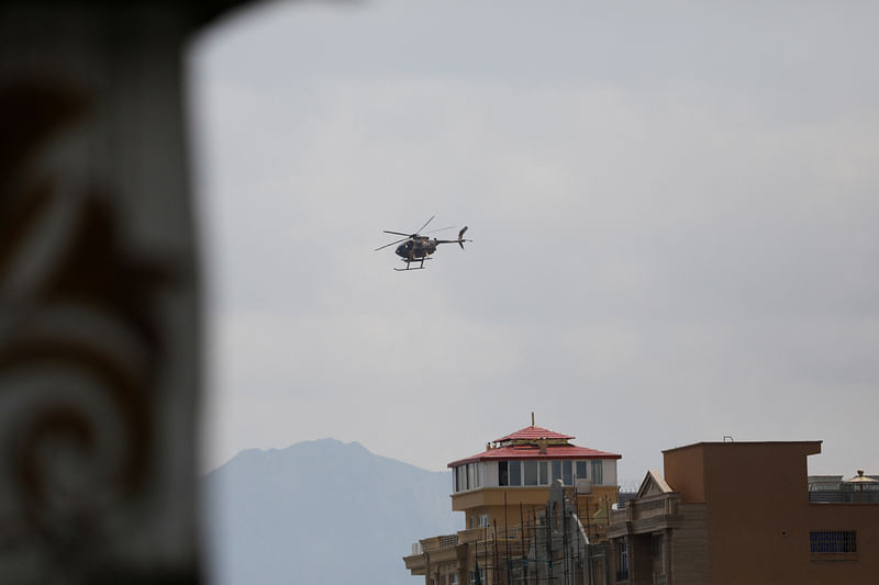 Taliban military helicopter flies over Kabul, Afghanistan August 17, 2022.