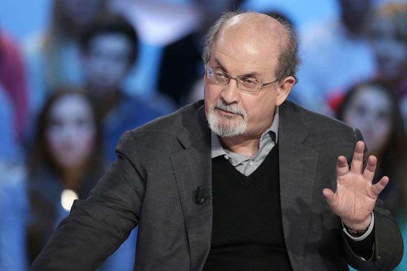 In this file photo taken on 16 November, 2012, British author Salman Rushdie takes part in the TV show "Le grand journal" on a set of French TV Canal+ in Paris. It has been reported that Rushdie was attacked on stage today during an event in New York.