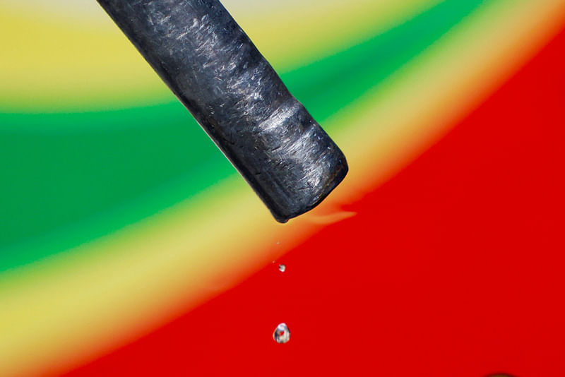 Fuel droplets fall from a nozzle at a gasoline station in Dhaka, Bangladesh on 6 August 2022