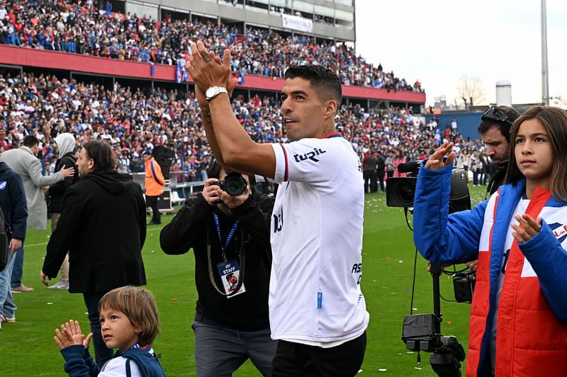 Uruguayan forward Luis Suarez acknowledges the crowd during his presentation as new player of Uruguay's Nacional at the Gran Parque Central stadium, in Montevideo, on 31 July, 2022