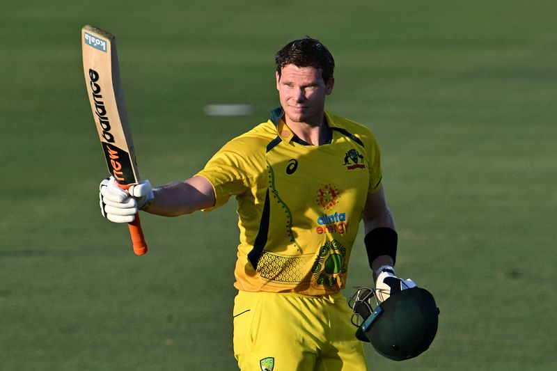 Australia's Steve Smith celebrates reaching his century (100 runs) during the third one-day international (ODI) cricket match between Australia and New Zealand at the Cazalys Stadium in Cairns on 11 September, 2022