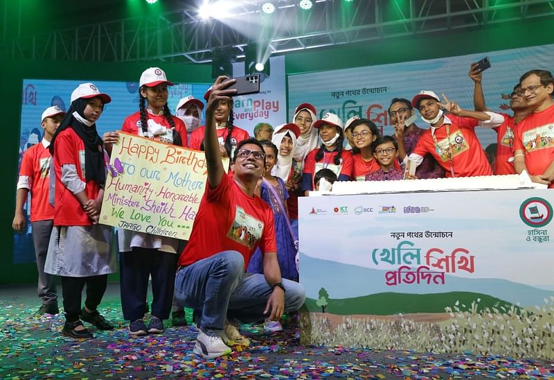 State Minister for ICT Zunaid Ahmed  Palak takes a selfie with children after inaugurating the digital platform on Wednesday.