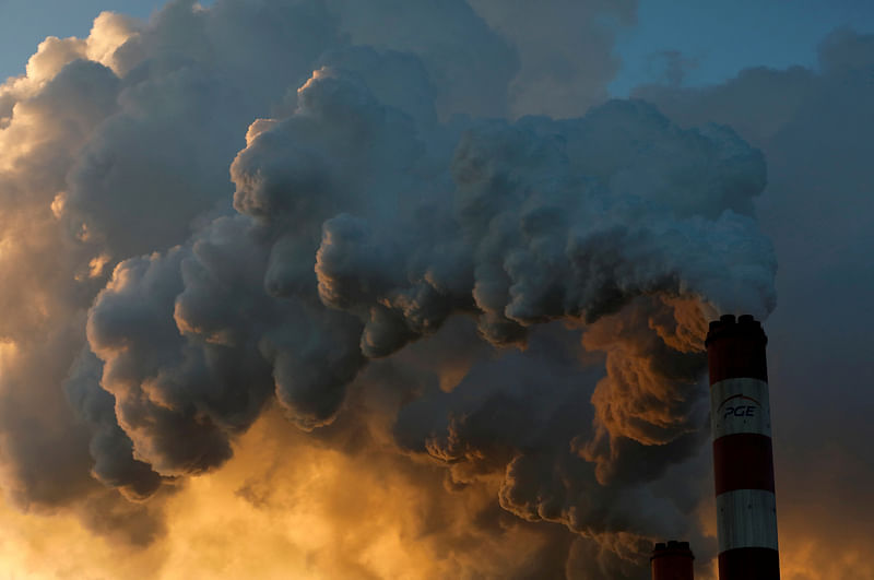 Smoke and steam billows from Belchatow Power Station, Europe's largest coal-fired power plant operated by PGE Group, near Belchatow, Poland 28 November, 2018.