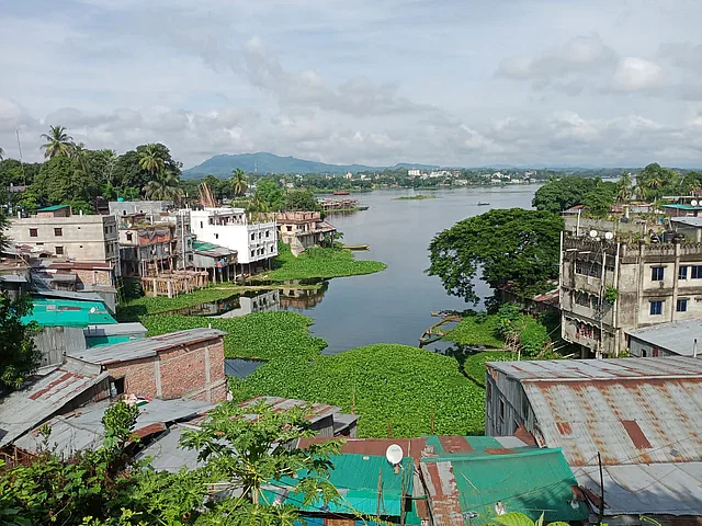 Kaptai Lake, an important water body in Rangamati, has become narrow due to encroachment. Different establishments have been constructed occupying the lake area. The picture was taken from the police super office area of the town on Friday.