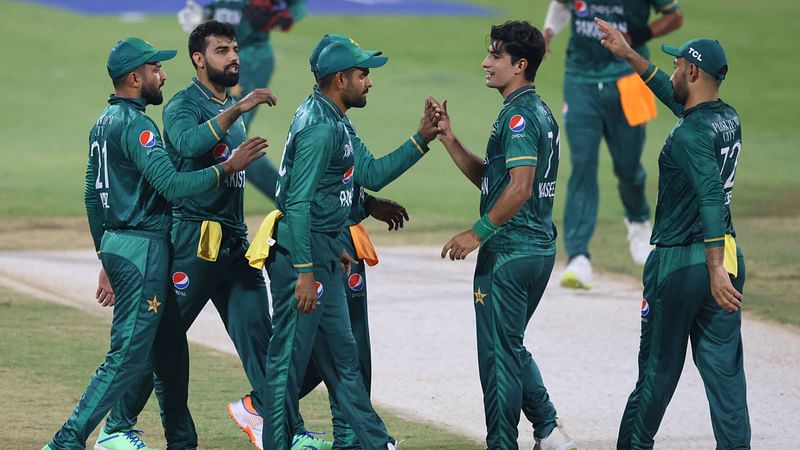 Pakistan's Naseem Shah (2R) celebrates with teammates after dismissing Hong Kong's captain Nizakat Khan (not pictured) during the Asia Cup Twenty20 international cricket match between Pakistan and Hong Kong at the Sharjah Cricket Stadium in Sharjah on 2 September, 2022