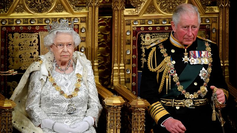 Britain's Queen Elizabeth and Charles, the Prince of Wales are seen ahead the Queen's Speech during the State Opening of Parliament in London, Britain on 14 October, 2019