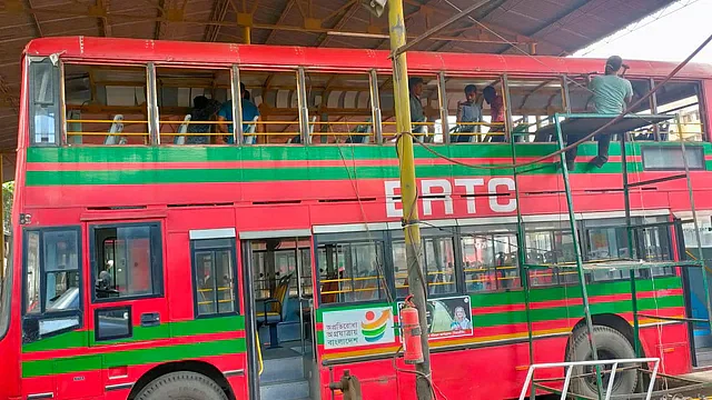 This BRTC bus is being converted into an open roof bus for the grand felicitation of the Bangladesh women's football team at the BRTC Motijheel Bus Depot on 20 September, 2022