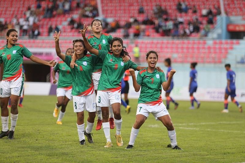 Bangladesh women's team celebrate after scoring against India in their SAFF Women's Championship match at the Rangasala Stadium in Kathmandu, Nepal on 13 September, 2022