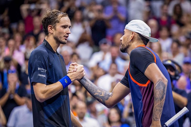 Russia's Daniil Medvedev (L) congratulates Australia's Nick Kyrgios (R) after winning their 2022 US Open Tennis tournament men's singles Round of 16 match at the USTA Billie Jean King National Tennis Center in New York, on 4 September, 2022