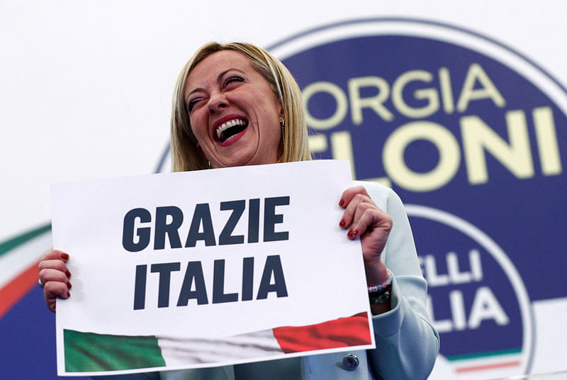 Leader of Brothers of Italy Giorgia Meloni holds a sign at the party's election night headquarters, in Rome, Italy on 26 September, 2022