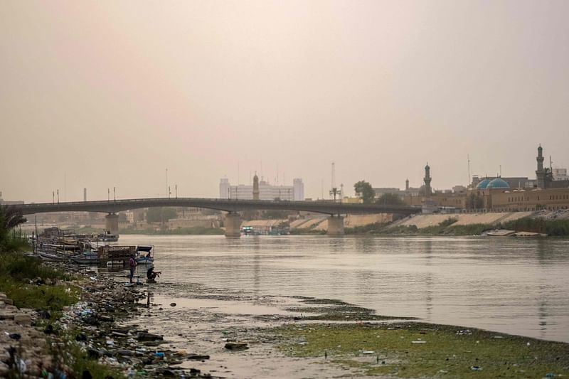 The Tigris river flows under the Ahrar bridge in the central Karkh district of the Iraqi capital Baghdad on 24 July, 2022