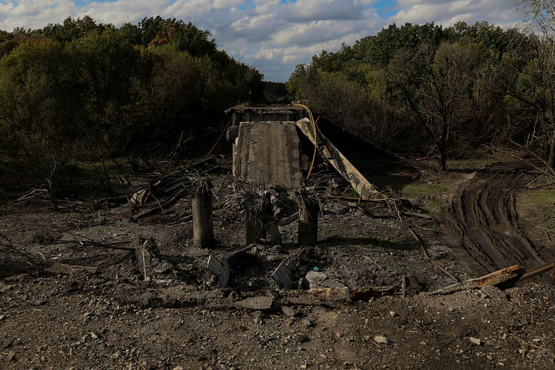 A view shows a destroyed bridge over the Siverskyi Donets river near the town of Balakliia, recently liberated by the Ukrainian Armed Forces during a counteroffensive operation, amid Russia's attack on Ukraine, in Kharkiv region, Ukraine 18 September, 2022.