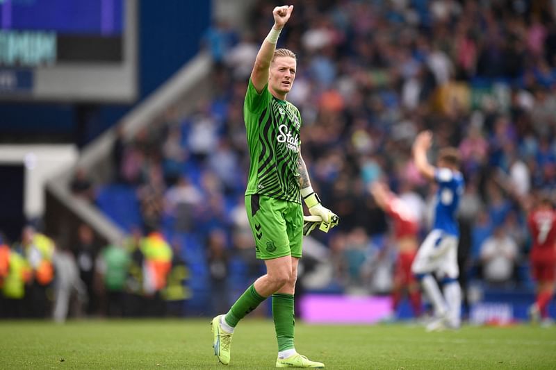 Man of the match, Everton's English goalkeeper Jordan Pickford leaves the pitch after the English Premier League football match between Everton and Liverpool at Goodison Park in Liverpool, north west England on 3 September, 2022