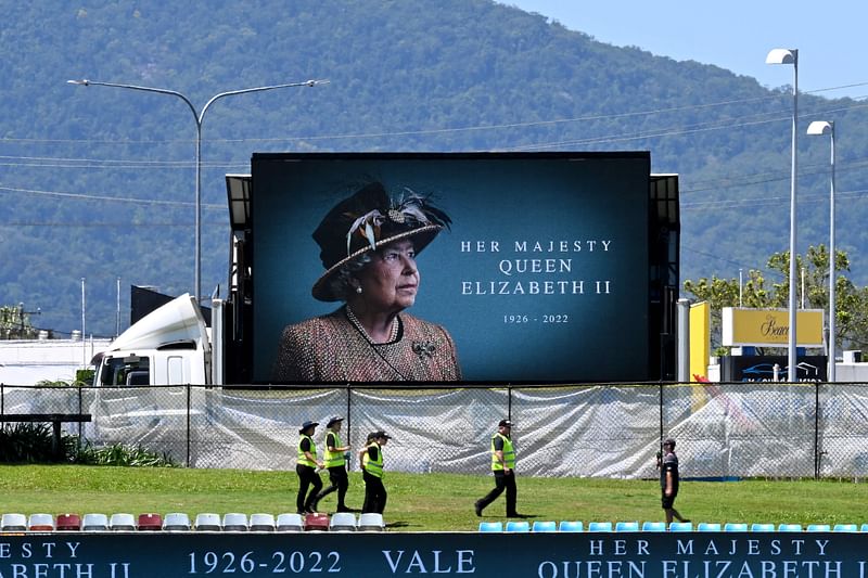 A portrait of Britain's late Queen Elizabeth II is displayed at the Cazalys Stadium prior to the third one-day international (ODI) cricket match between Australia and New Zealand in Cairns on 11 September, 2022