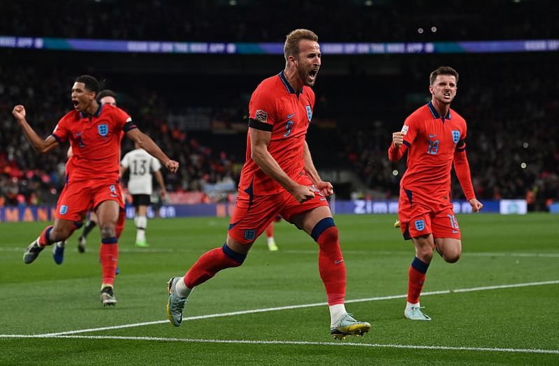 England's striker Harry Kane celebrates scoring the team's third goal from the penalty spot during the UEFA Nations League group A3 football match between England and Germany at Wembley stadium in north London on 26 September, 2022