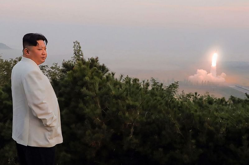 This undated picture released from North Korea's official Korean Central News Agency (KCNA) on 10 October, 2022 shows North Korea's leader Kim Jong Un monitoring a North Korean missile launch at an undisclosed location