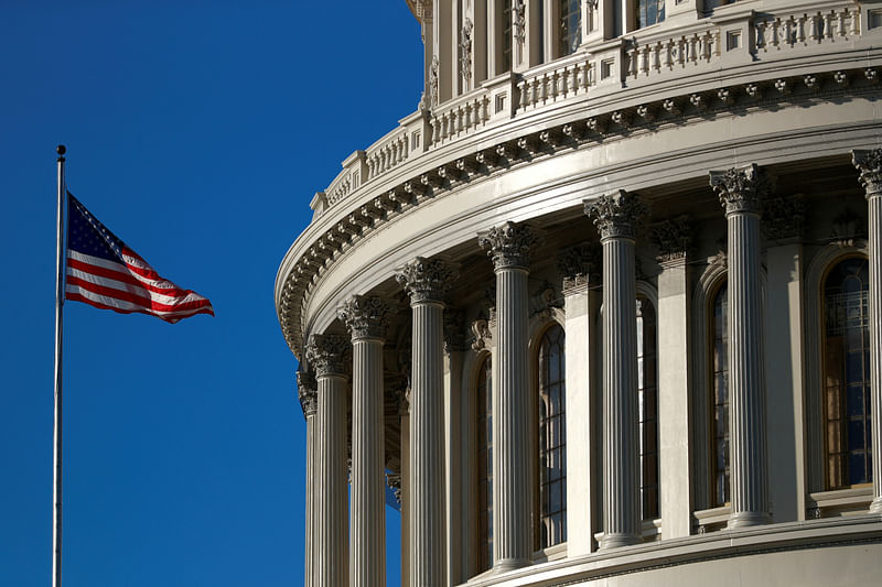 An American flag flies outside of the US Capitol dome in Washington, US, 15 January, 2020.