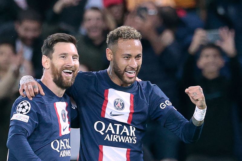 Paris Saint-Germain's Brazilian forward Neymar (R) celebrates with Paris Saint-Germain's Argentine forward Lionel Messi after scoring his team's third goal during the UEFA Champions League Group H second leg football match between Paris Saint-Germain (PSG) and Maccabi Haifa FC at the Parc des Princes stadium in Paris on 25 October, 2022.