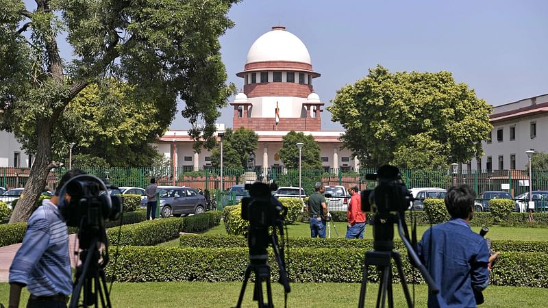 Cameras mounted near the Supreme Court complex, the apex judicial body of India, in New Delhi on 14 October 2022