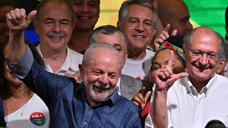 Elected president and vice president for the leftist Workers Party (PT) Luiz Inacio Lula da Silva (L) and Geraldo Alckmin (R) celebrate after winning the presidential run-off election, in Sao Paulo, Brazil, on 31 October, 2022