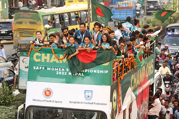 SAFF champion Bangladesh team celebrate their triumph on an open roof bus in Dhaka