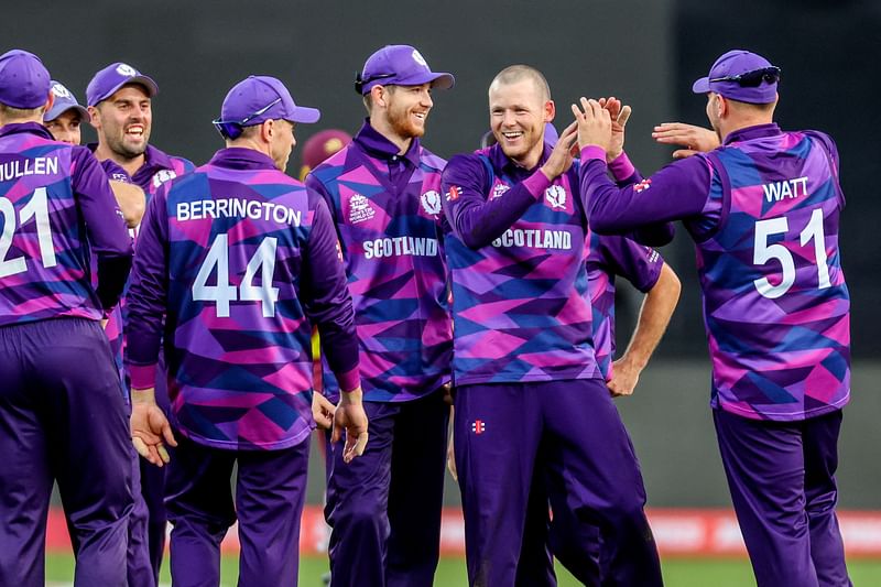 Scotland’s Michael Leask (2nd R) celebrates with team mates after the dismissal of West Indies’ batsman Akeal Hosein during the Australia 2022 Twenty20 World Cup cricket tournament match between West Indies and Scotland at Bellerive Oval in Hobart on 17 October, 2022